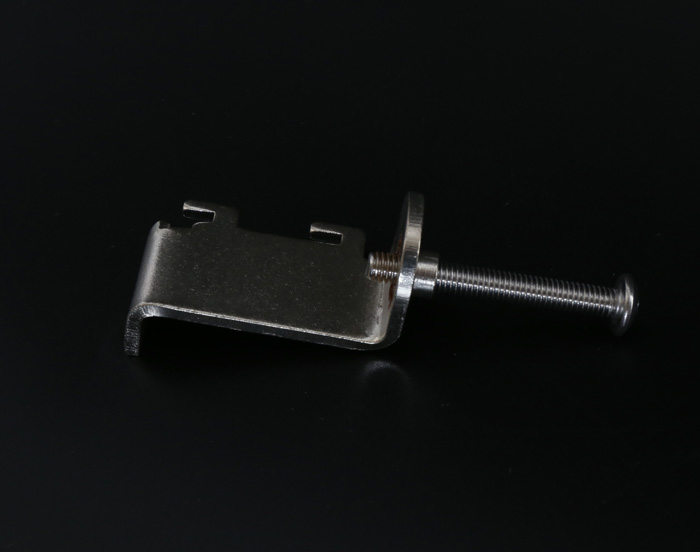 Assembly with threaded holes