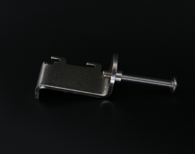 Assembly with threaded holes